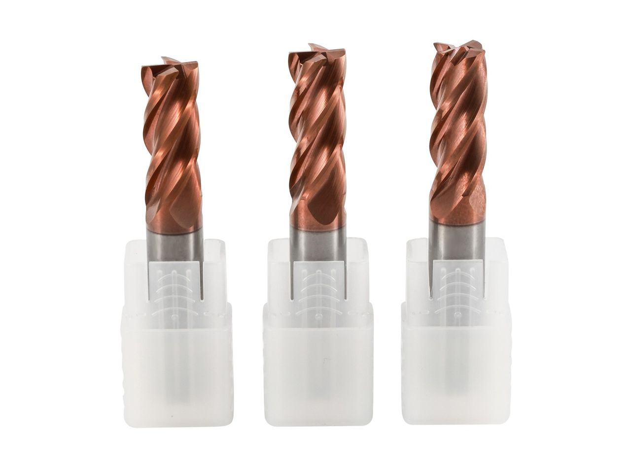 Three bronze-coated end mills in white holders