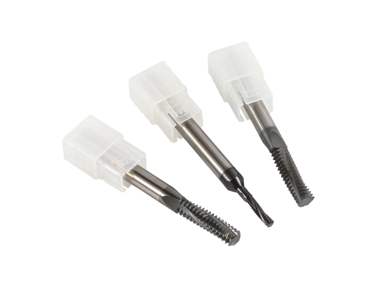 Three full-thread milling cutters in translucent holders