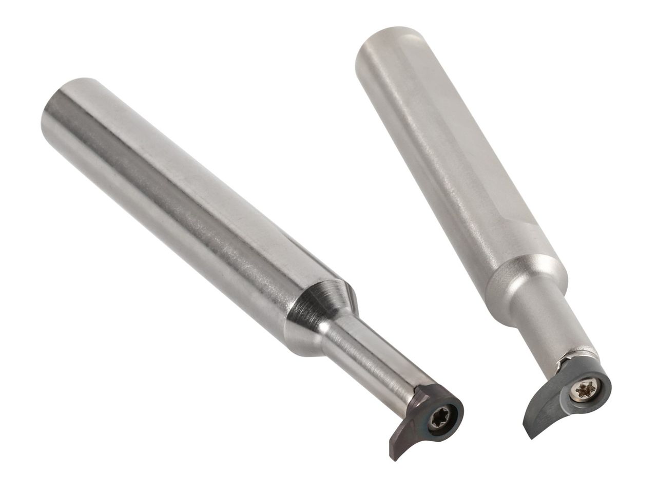 Two small-bore holders with comma-type inserts