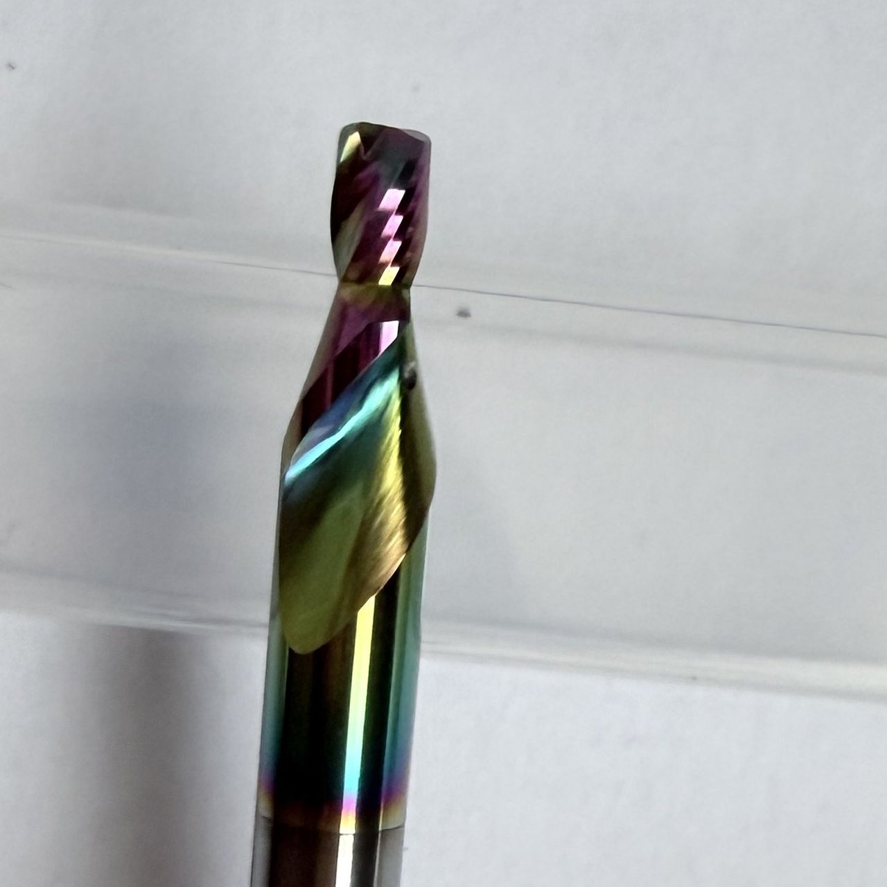 Custom two-flute stepped carbide tool with a multicolour coating