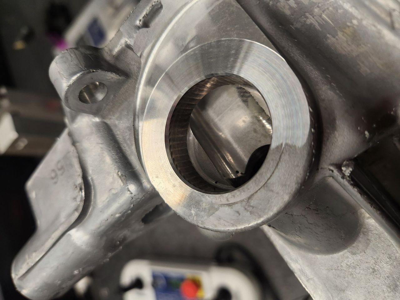 Machined bore in an aluminum housing