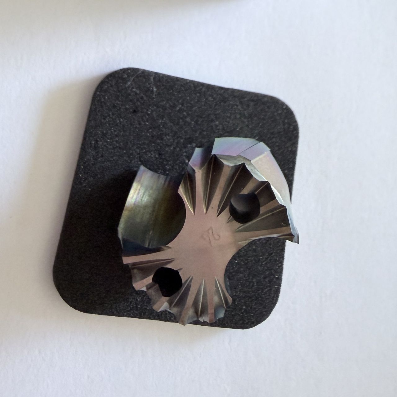 Coated crown drill tip for aluminium, viewed from the point